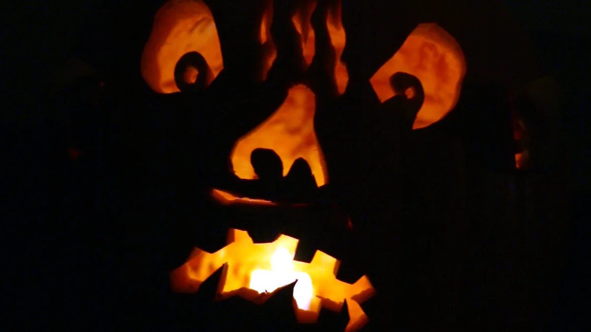 Display of festive smiling jack-o-lanterns bringing seasonal comfort to holiday television rewatches